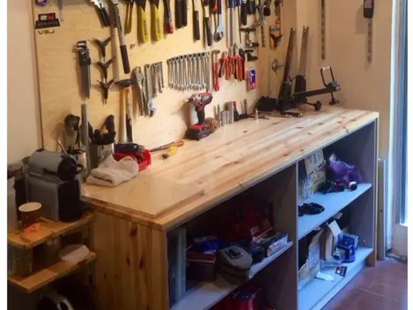 Workbench with tool wall above